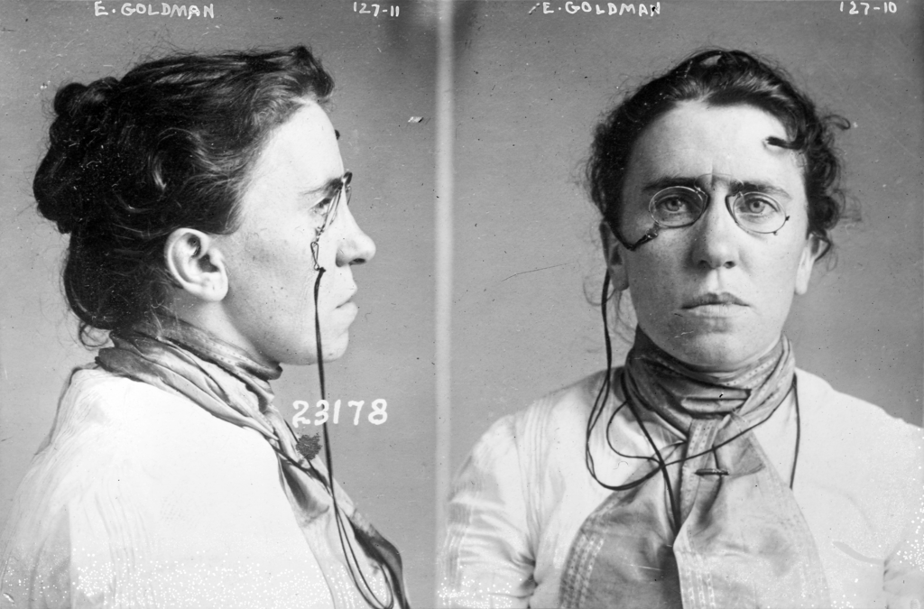 Black and white mugshots of Emma Goldman, profile and front views