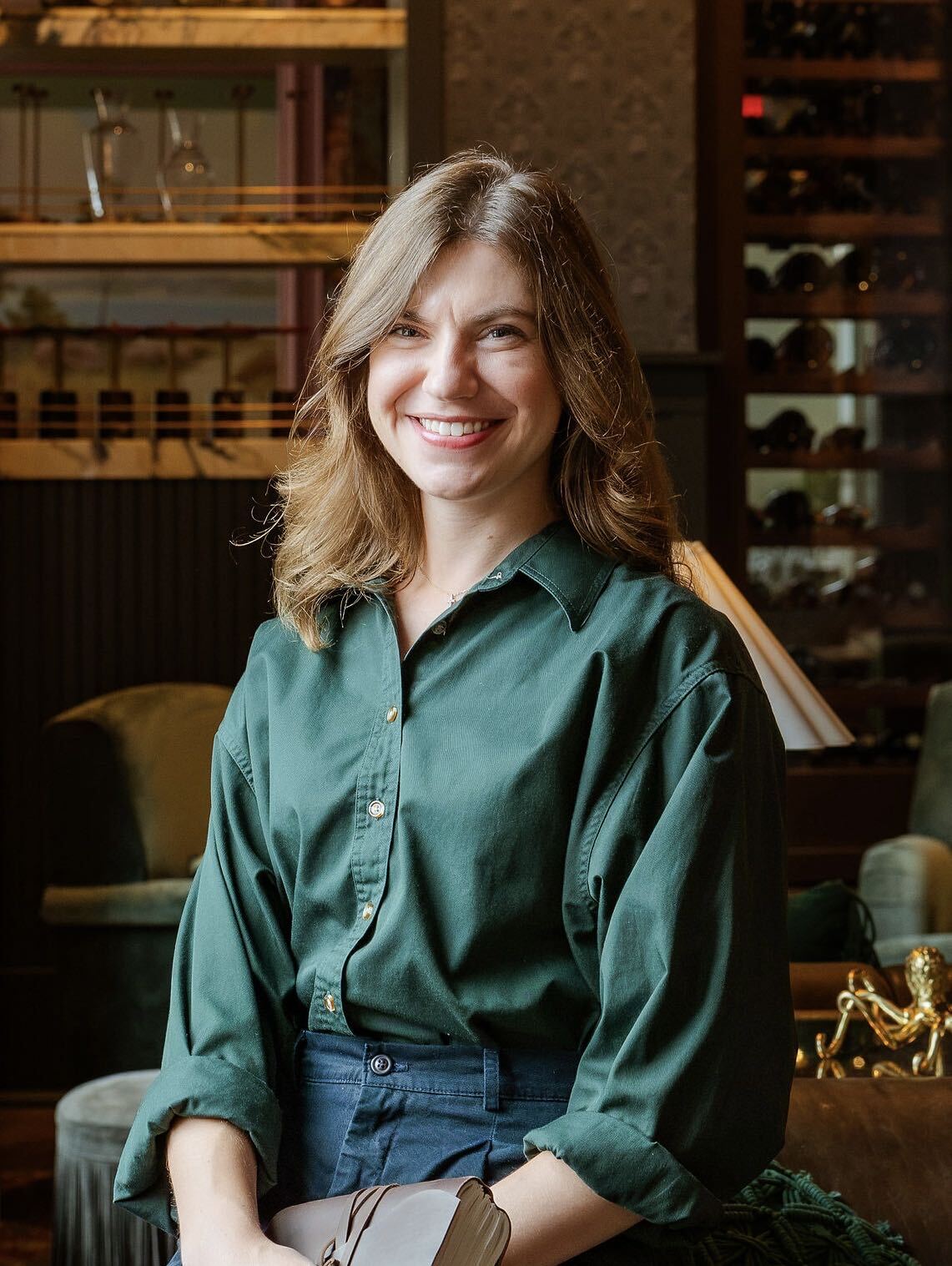 Emily Parrow in a teal blouse