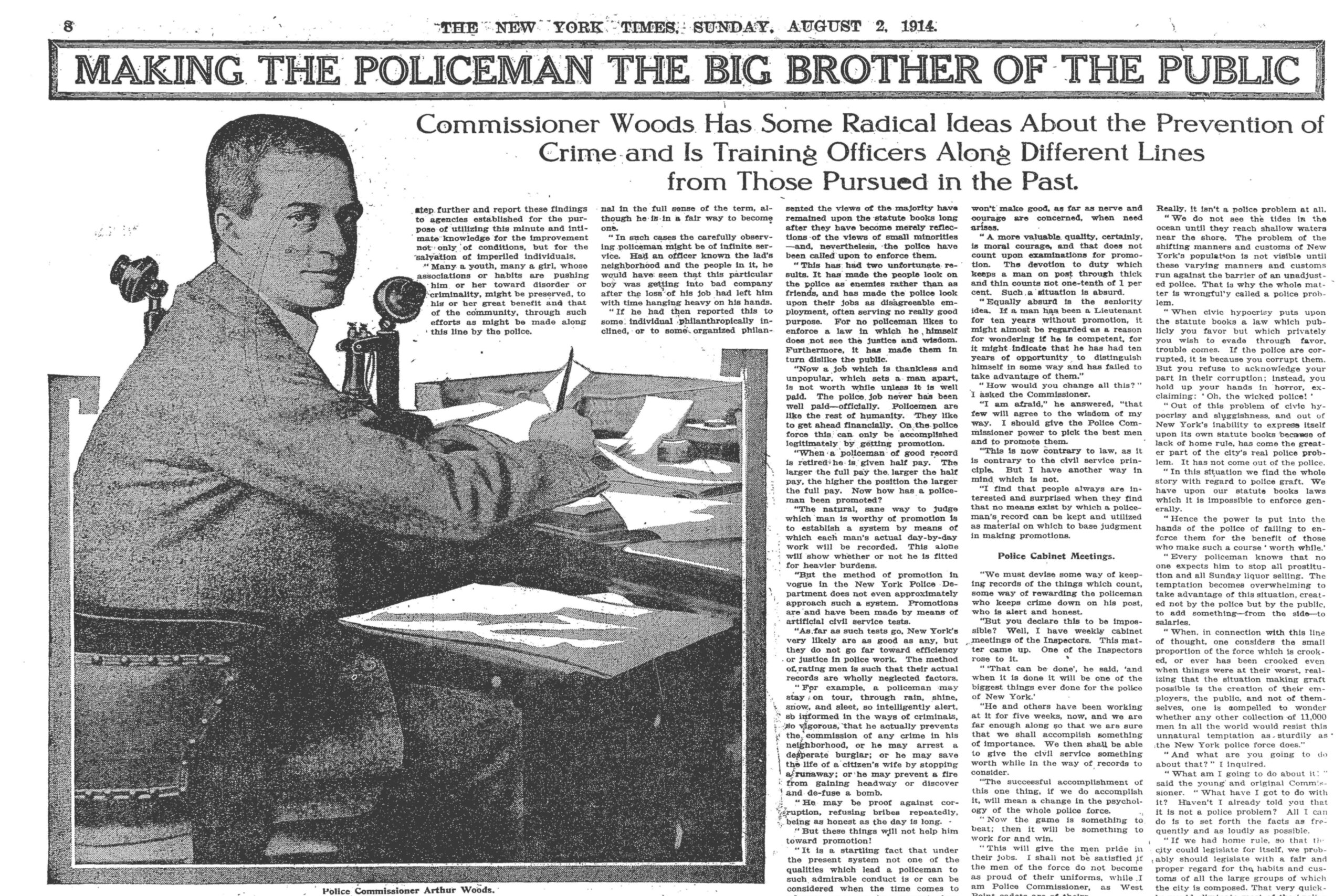 Black and white newspaper article with heading, "Making the Policeman the Big Brother of the Public." Subheading reads, "Commissioner Woods Has Some Radical Ideas About the Prevention of Crime and Is Training Officers Along Different Lines from Those Pursued in the Past." Includes image of Woods seated at a desk, facing the viewer.
